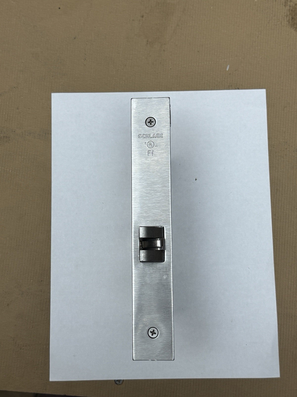 Schlage L9010 - Mortise Body Lock - Passage - Face / Cover Plate (Description) — photo 3