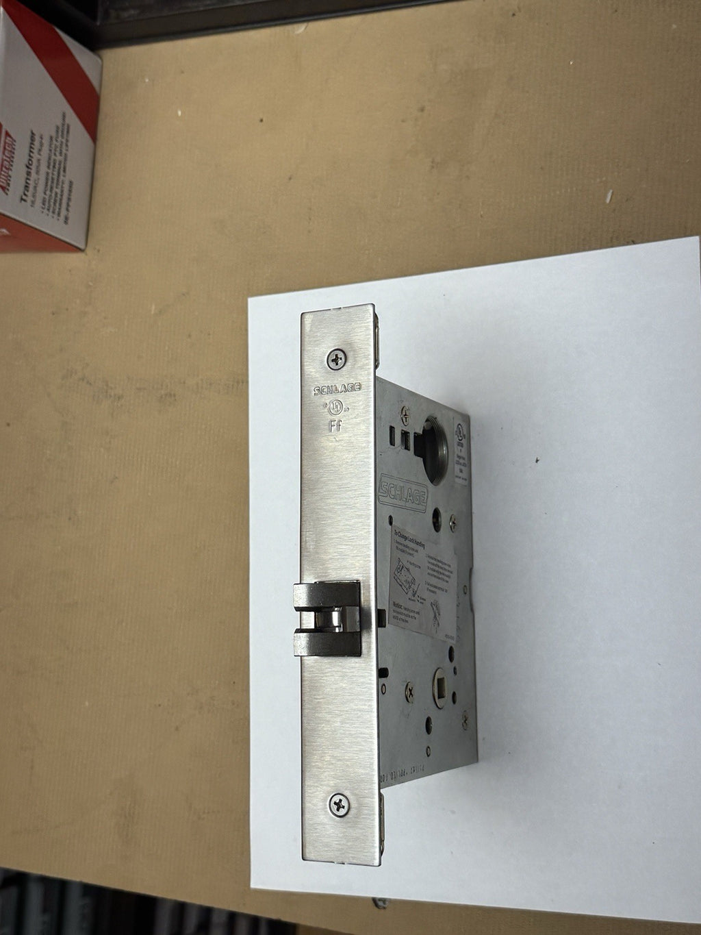 Schlage L9010 - Mortise Body Lock - Passage - Face / Cover Plate (Description) — photo 5