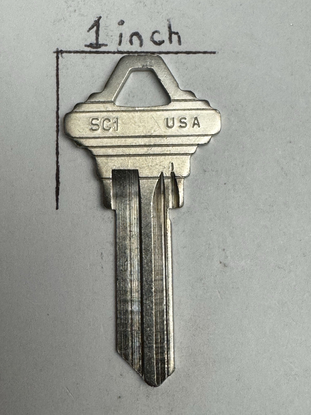 Ilco - SC1 - Schlage - Key Blank - 5 Pin - Cut to Code Nickle Plated Brass — photo 5