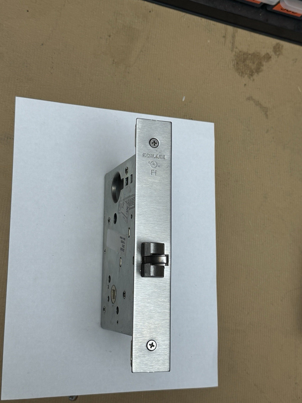 Schlage L9010 - Mortise Body Lock - Passage - Face / Cover Plate (Description) — photo 4
